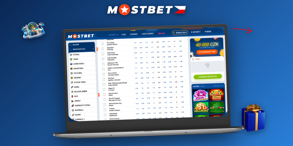 Notebook s Windows a MacBook s Mostbet desktop aplikací vedle sebe na pracovním stole